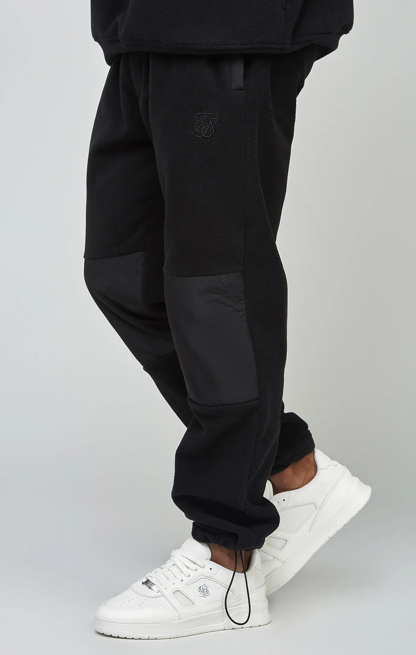 Ecru Polar Fleece Panelled Cuffed Jogger sold by Siksilk