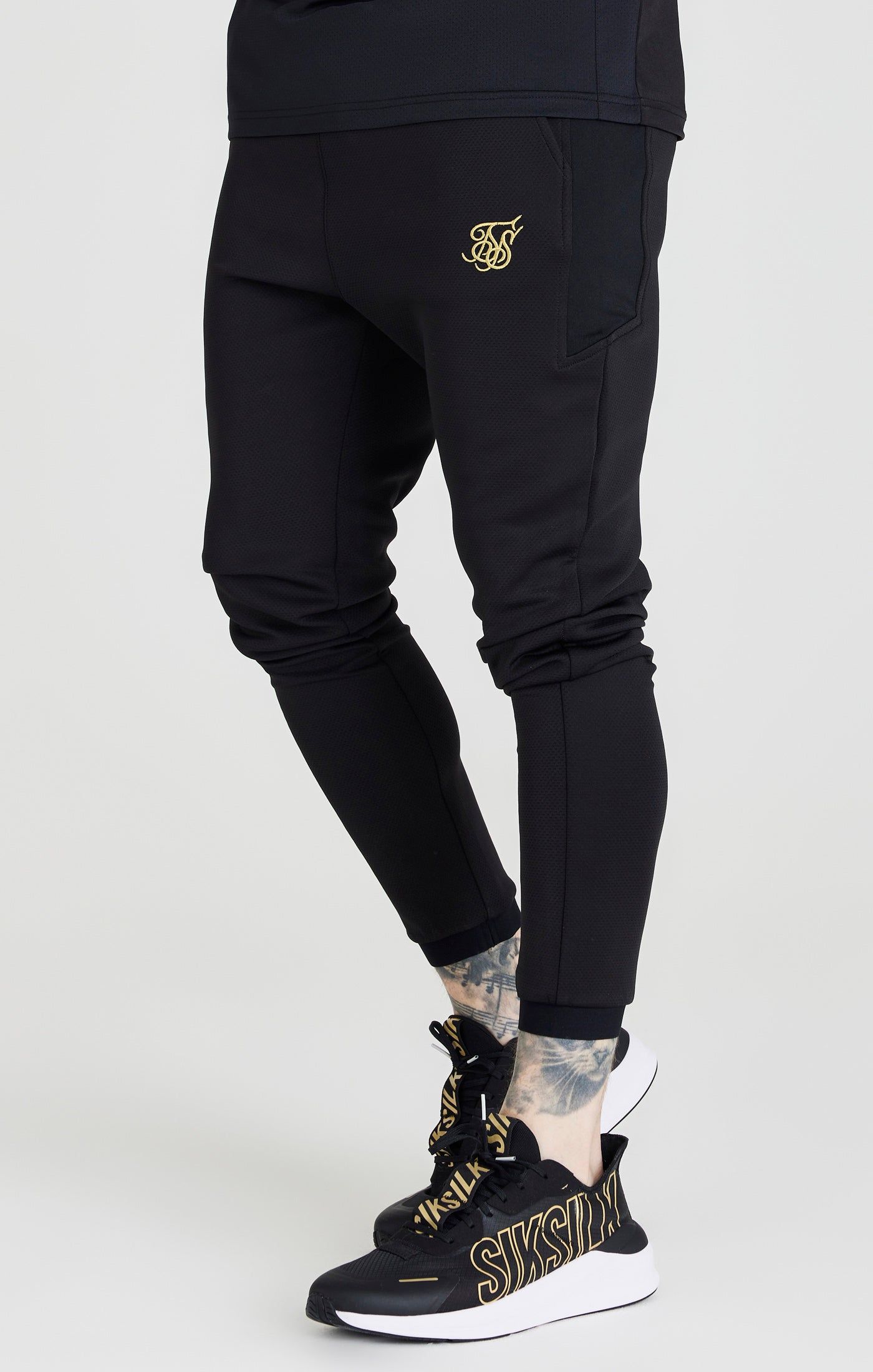 Black Retro Sports Scope Pant sold by Siksilk