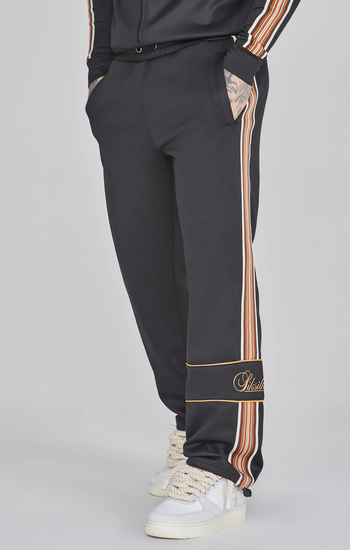 Black Track Pants sold by Siksilk