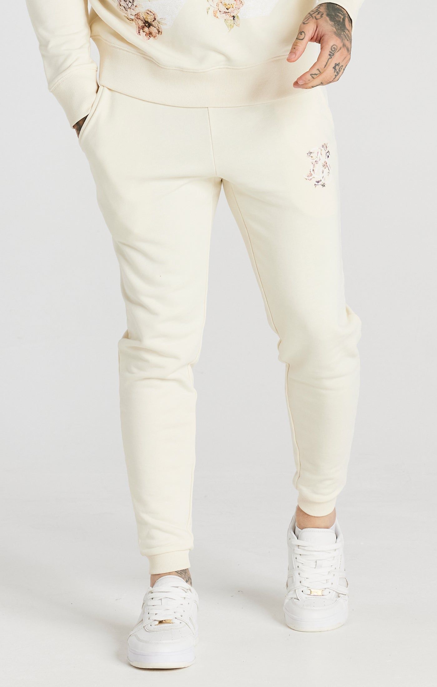 Ecru Faded Floral Jogger sold by Siksilk