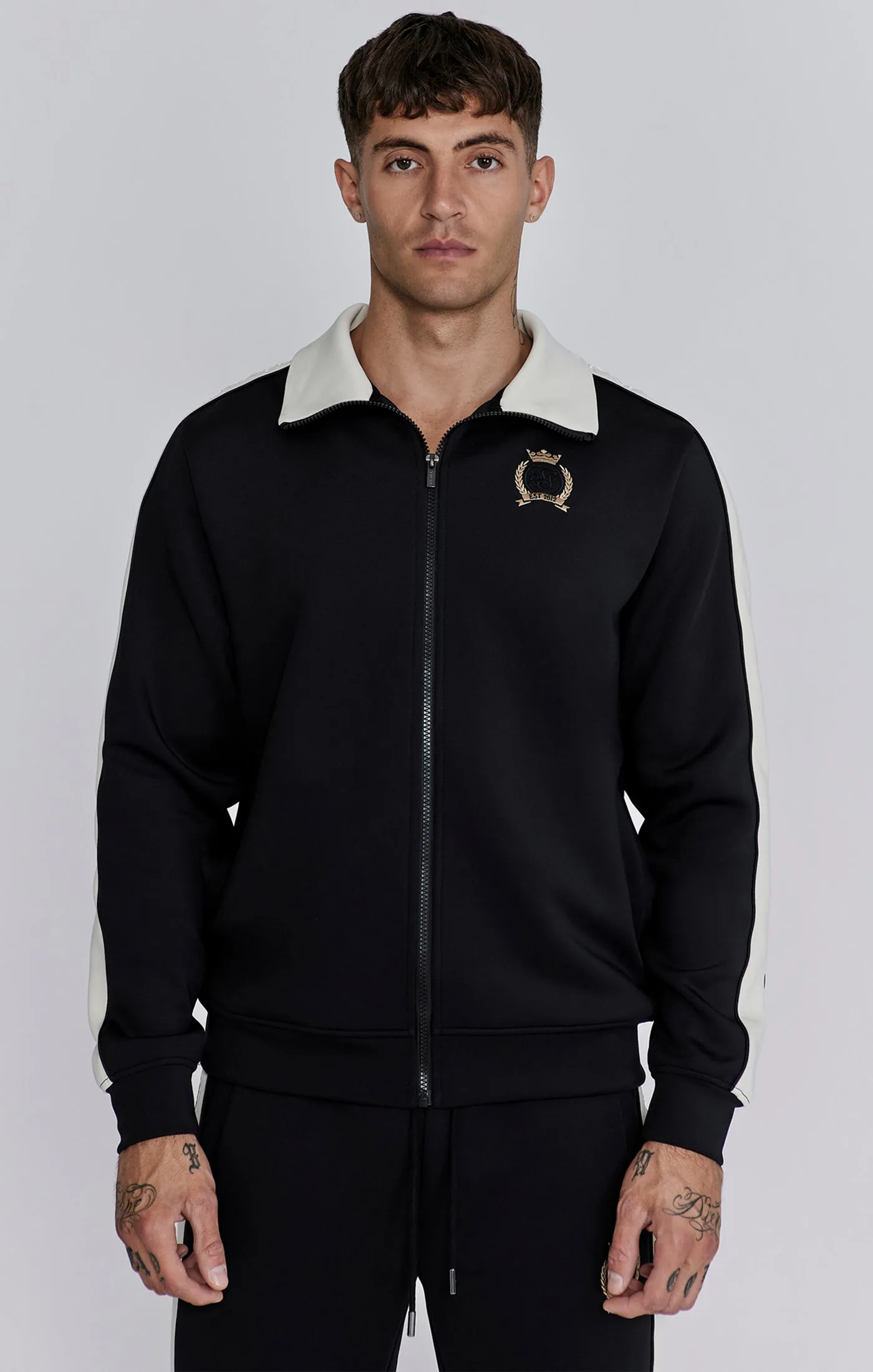 Black Crest Track Top sold by Siksilk