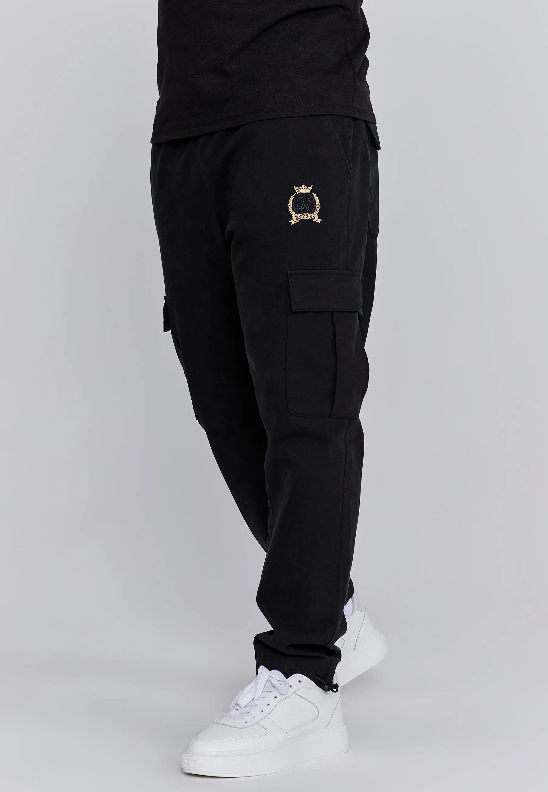 Black Cargo Pants sold by Siksilk