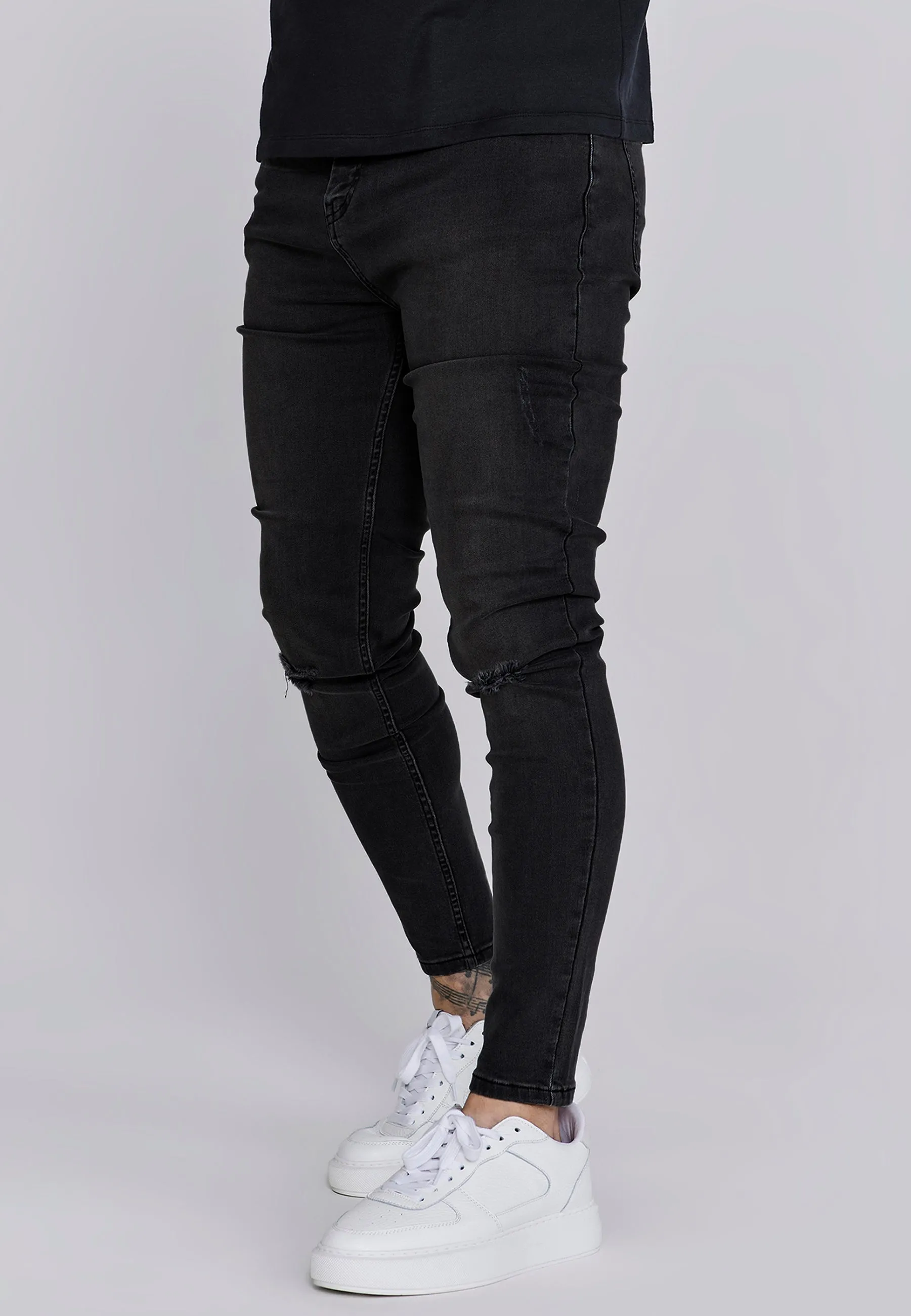 Skinny Jeans Washed Black sold by Siksilk