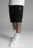 Black Cargo Shorts sold by Siksilk