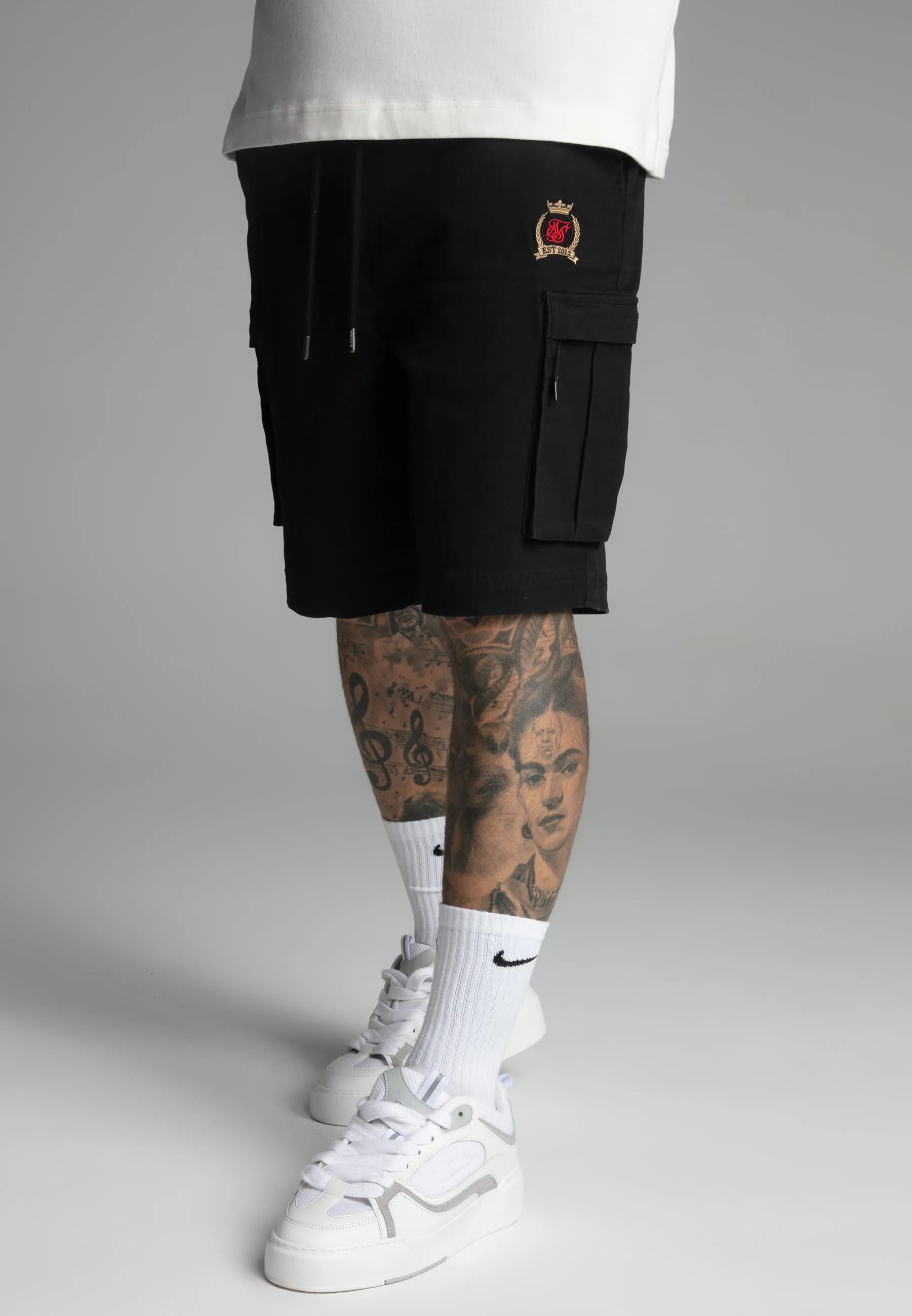 Black Cargo Shorts sold by Siksilk