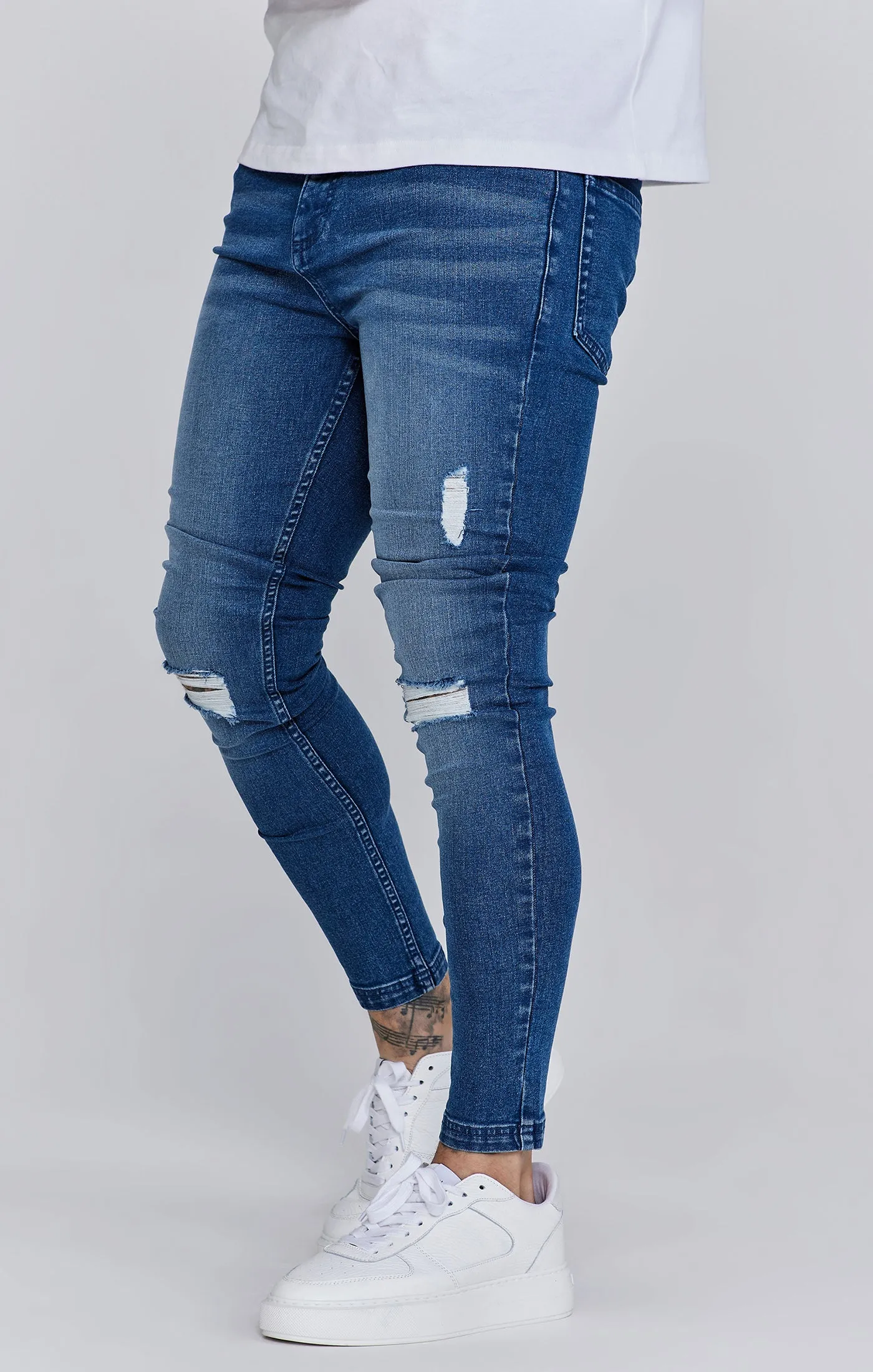Skinny Jeans Washed Mid Blue sold by Siksilk