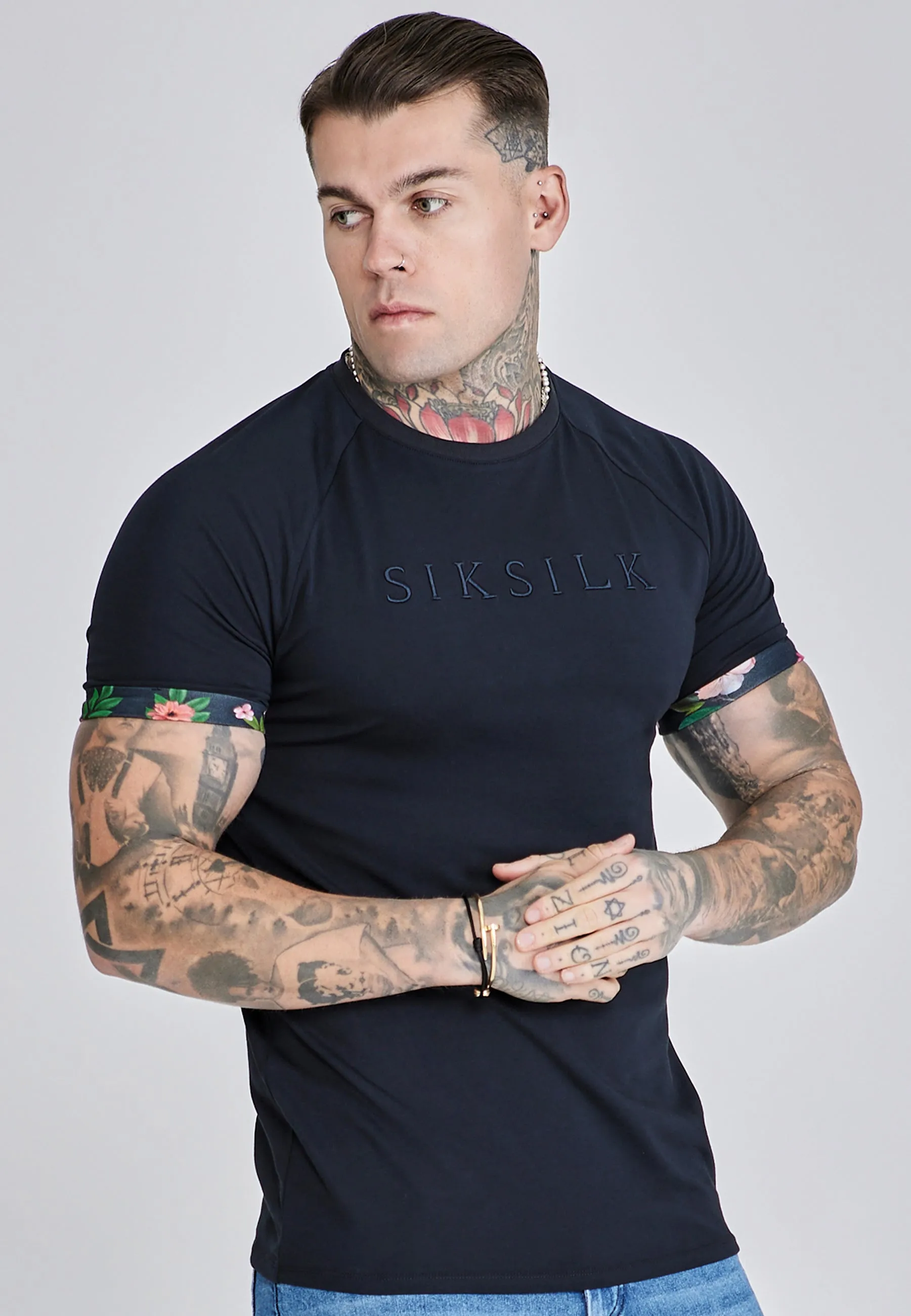 Navy Roll Sleeve T-Shirt sold by Siksilk