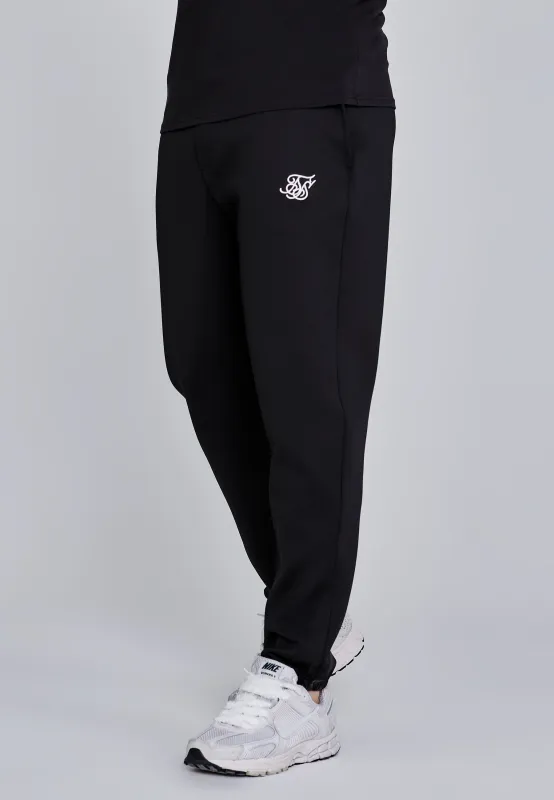 Black Essentials Poly Joggers sold by Siksilk