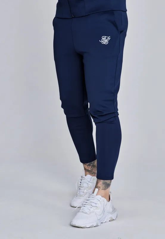 Navy Essentials Poly Joggers sold by Siksilk