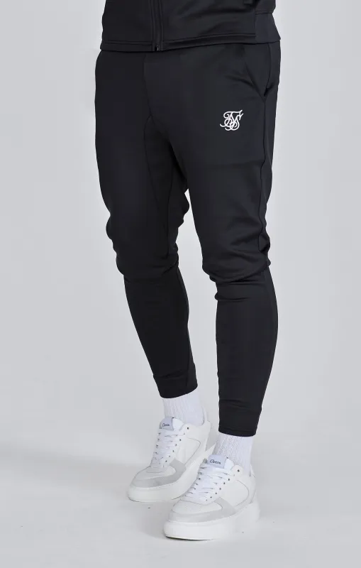 Black Essentials Poly Joggers sold by Siksilk