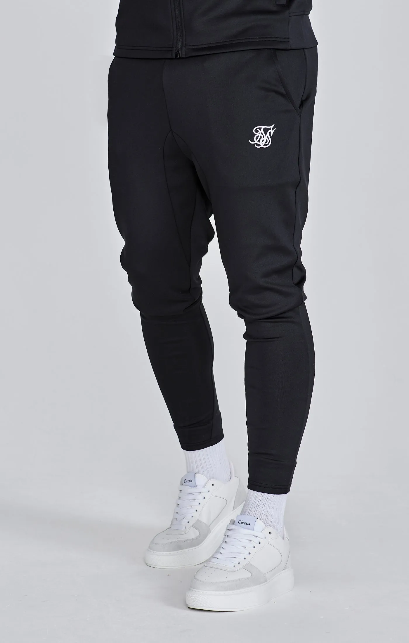 Black Essentials Poly Joggers sold by Siksilk