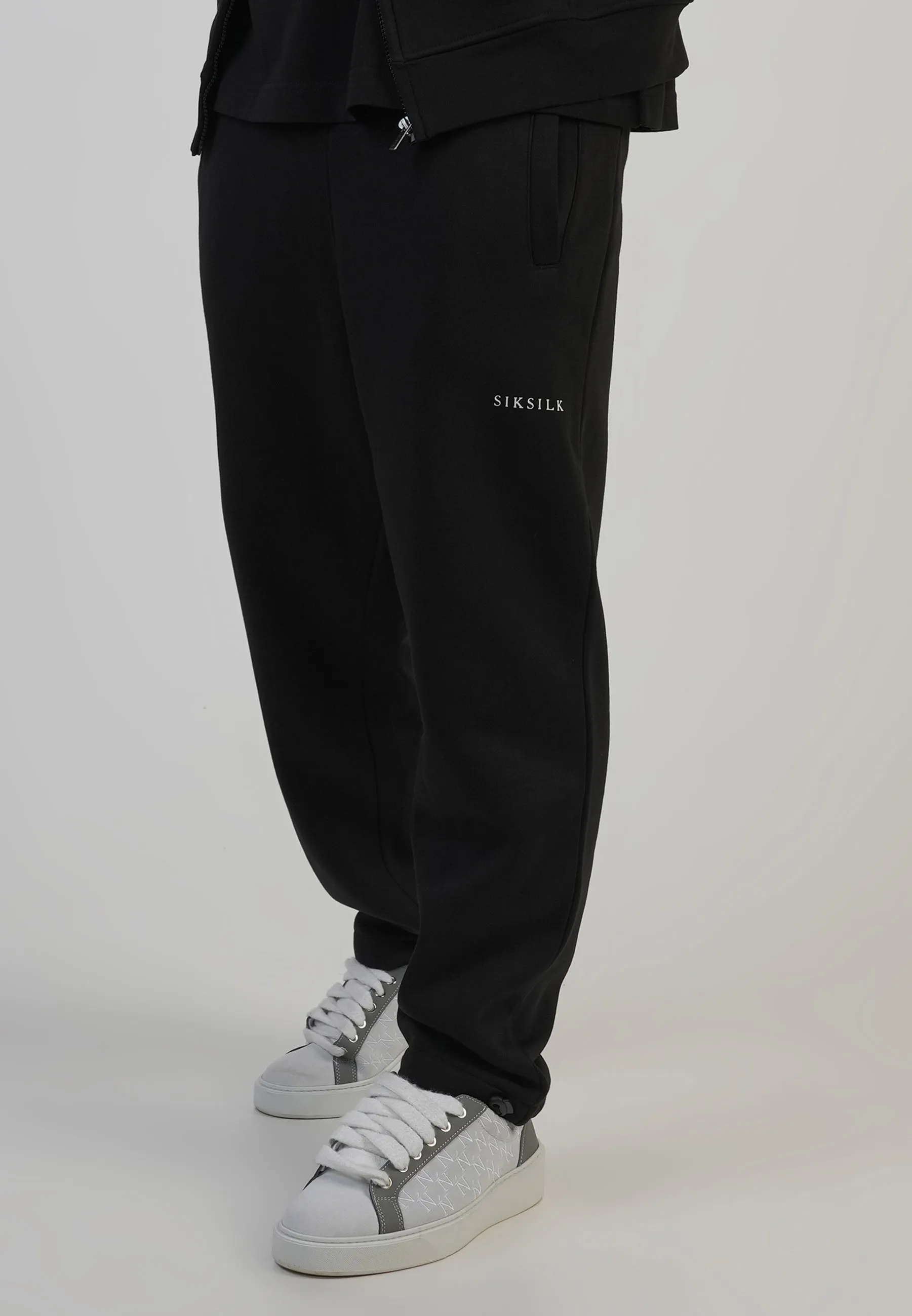 Black Track Pants sold by Siksilk