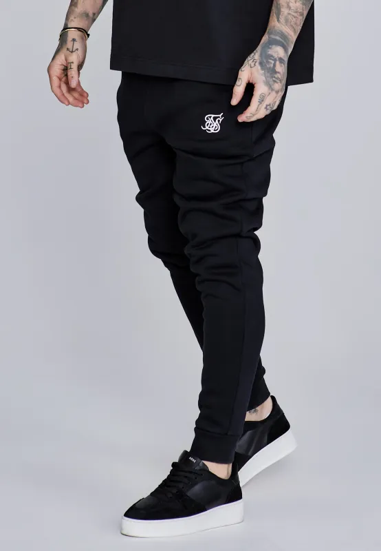 Black Essentials Joggers sold by Siksilk