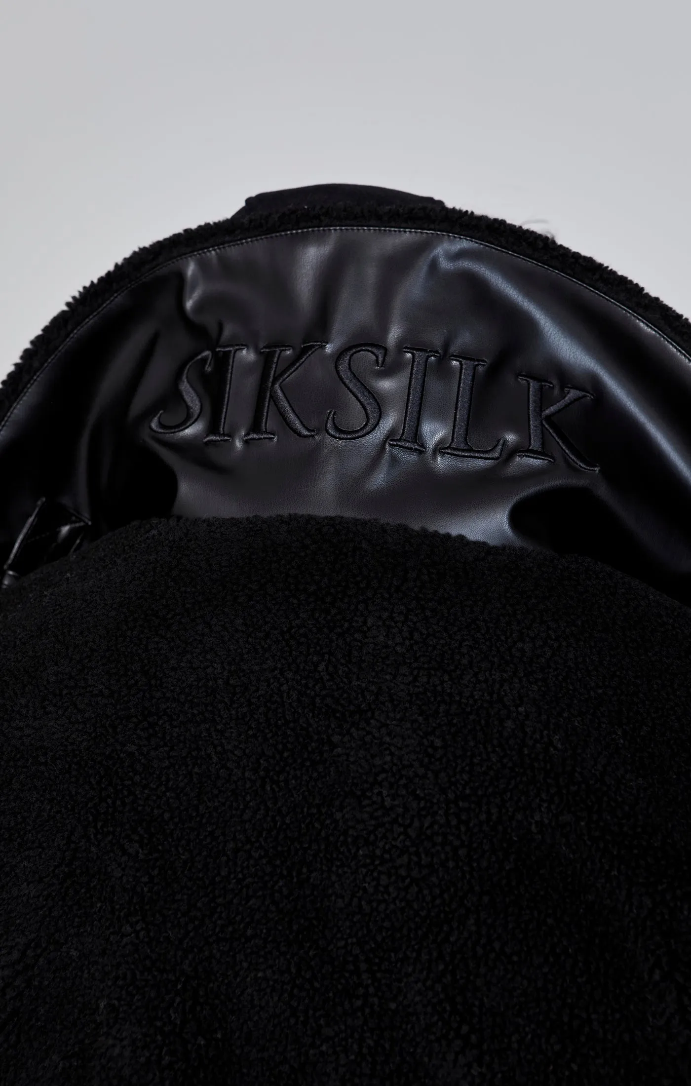 Black Sherpa Bomber Jacket sold by Siksilk product image thumbnail 3