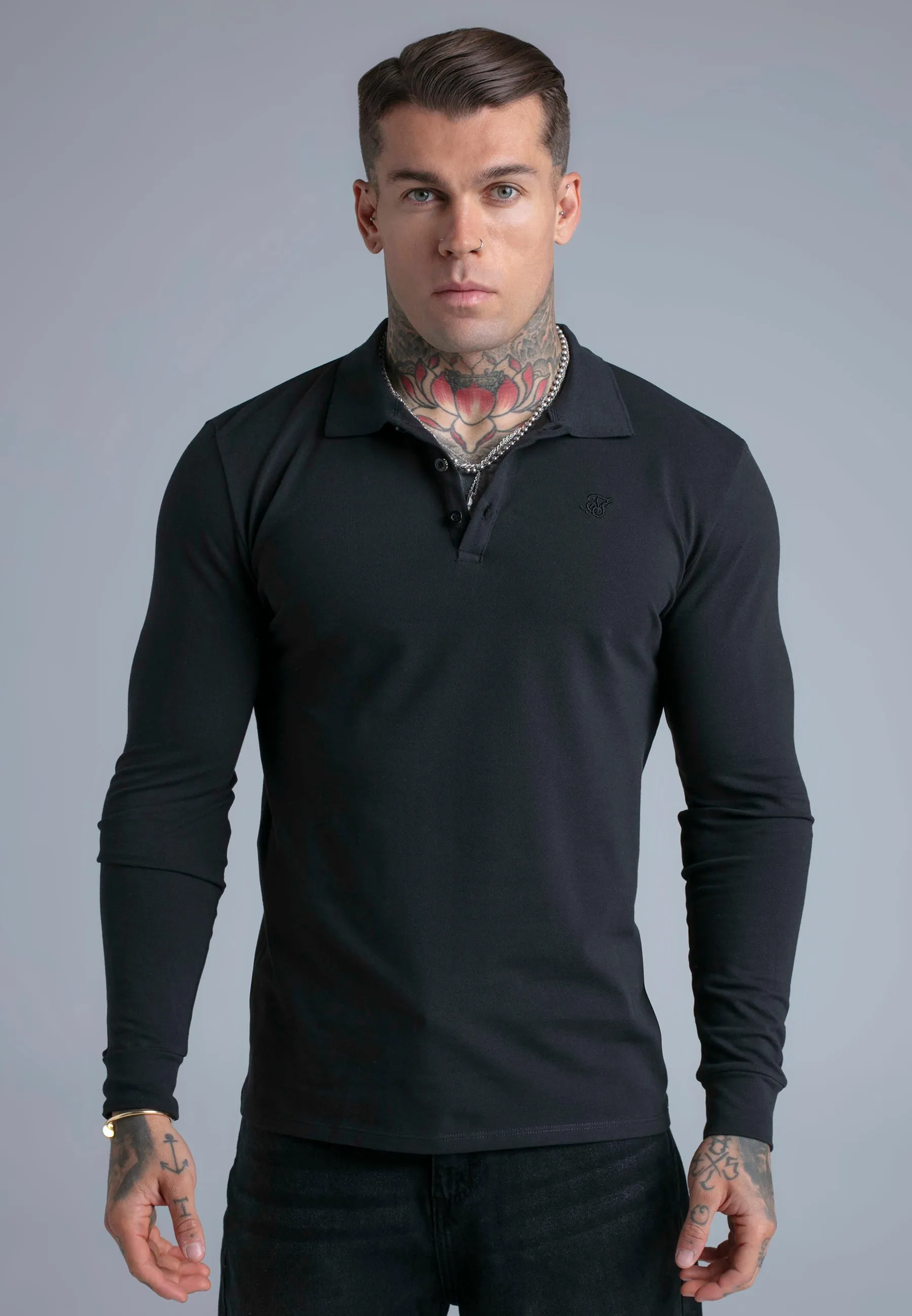 Black LS Button Polo sold by Siksilk