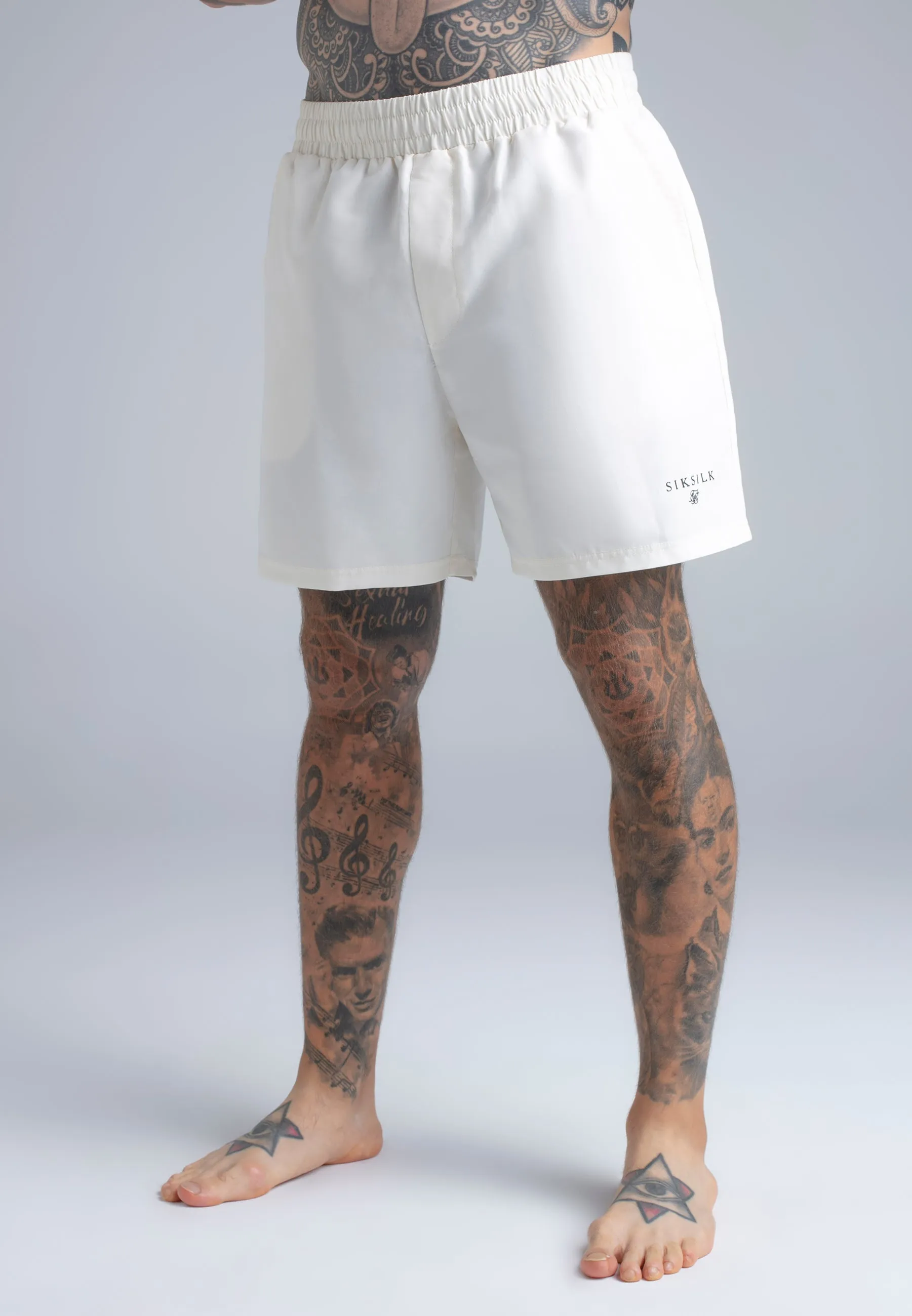 Ecru Swim Shorts sold by Siksilk