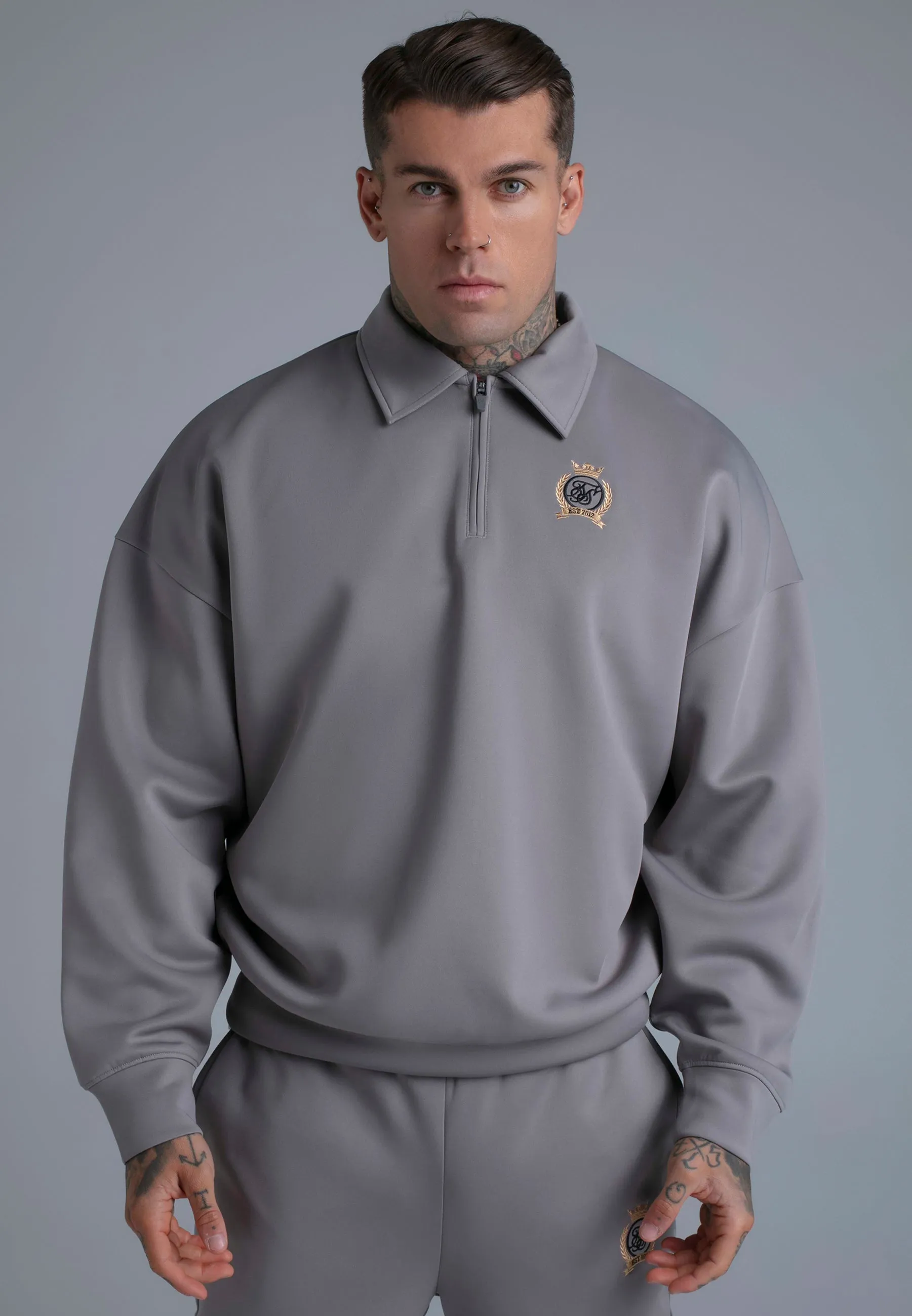 Grey Polo Zip Sweater sold by Siksilk