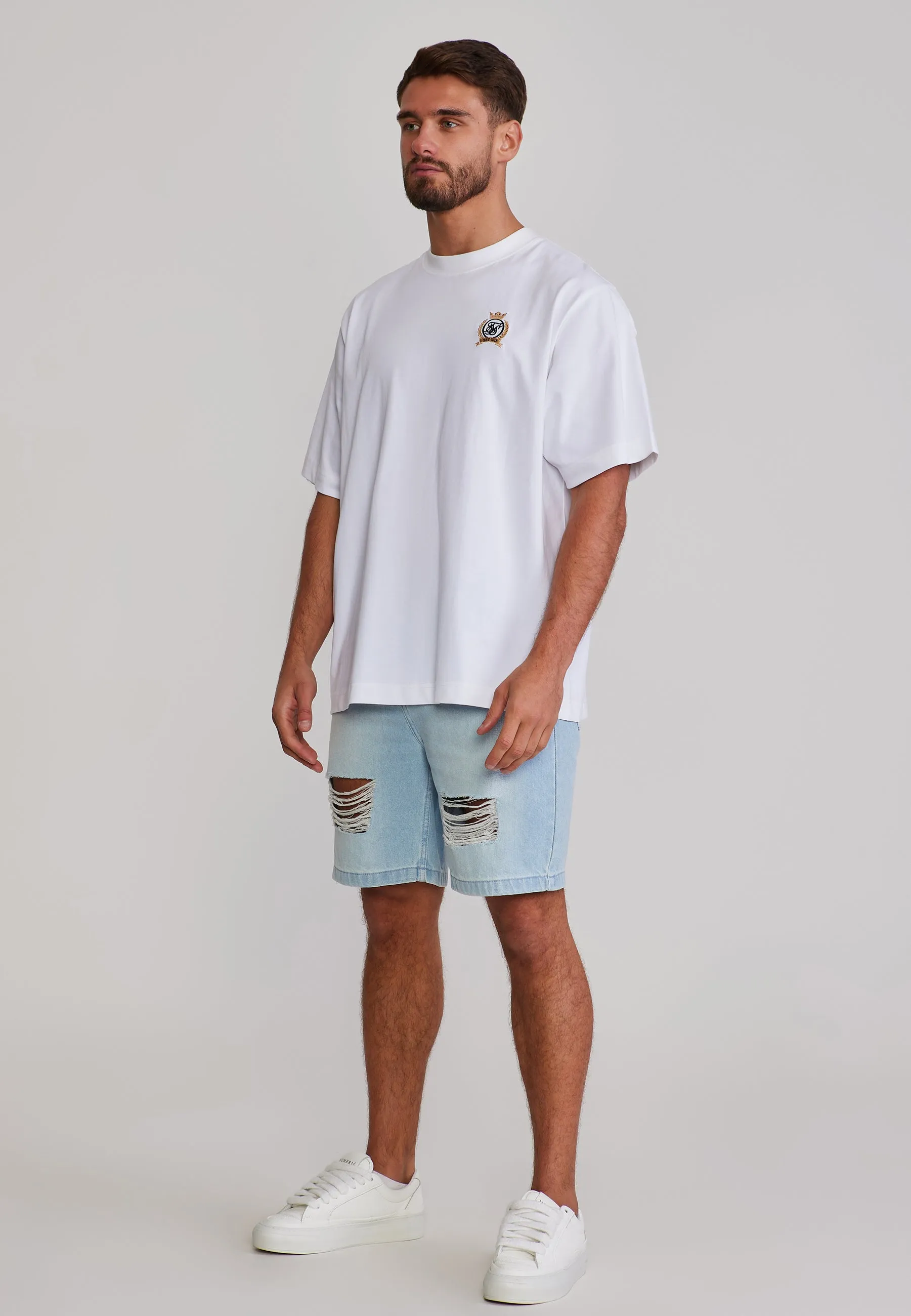 Washed Light Blue Distressed Denim Shorts sold by Siksilk product image thumbnail 4