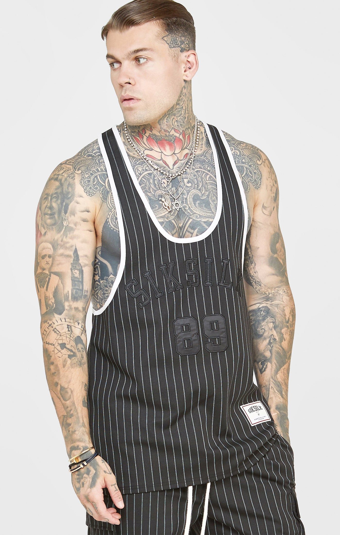 Black Anniversary Racer Back Vest sold by Siksilk