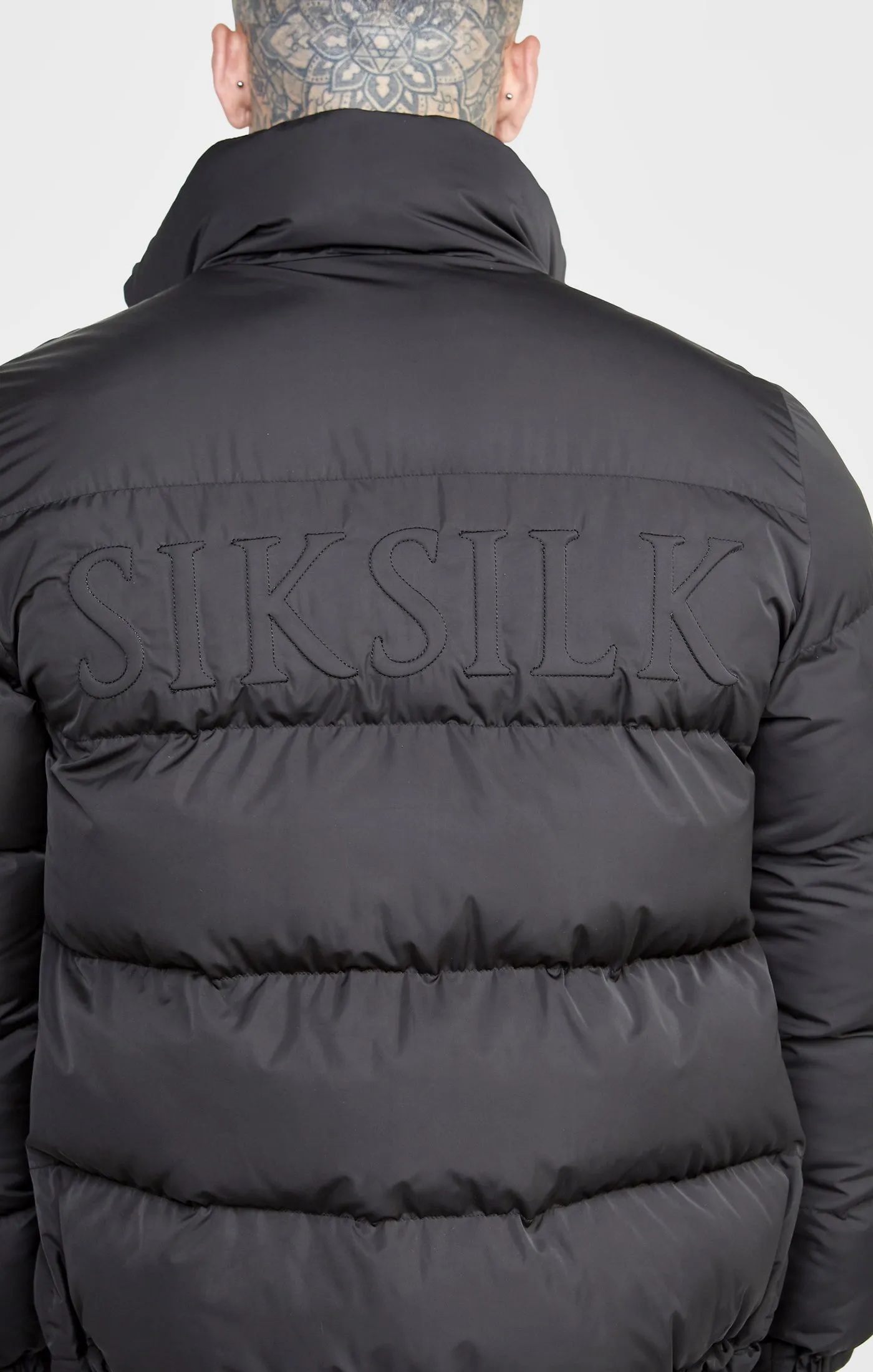 Black Embossed Logo Bubble Jacket sold by Siksilk product image thumbnail 2