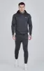 Grey Essentials Poly Joggers sold by Siksilk