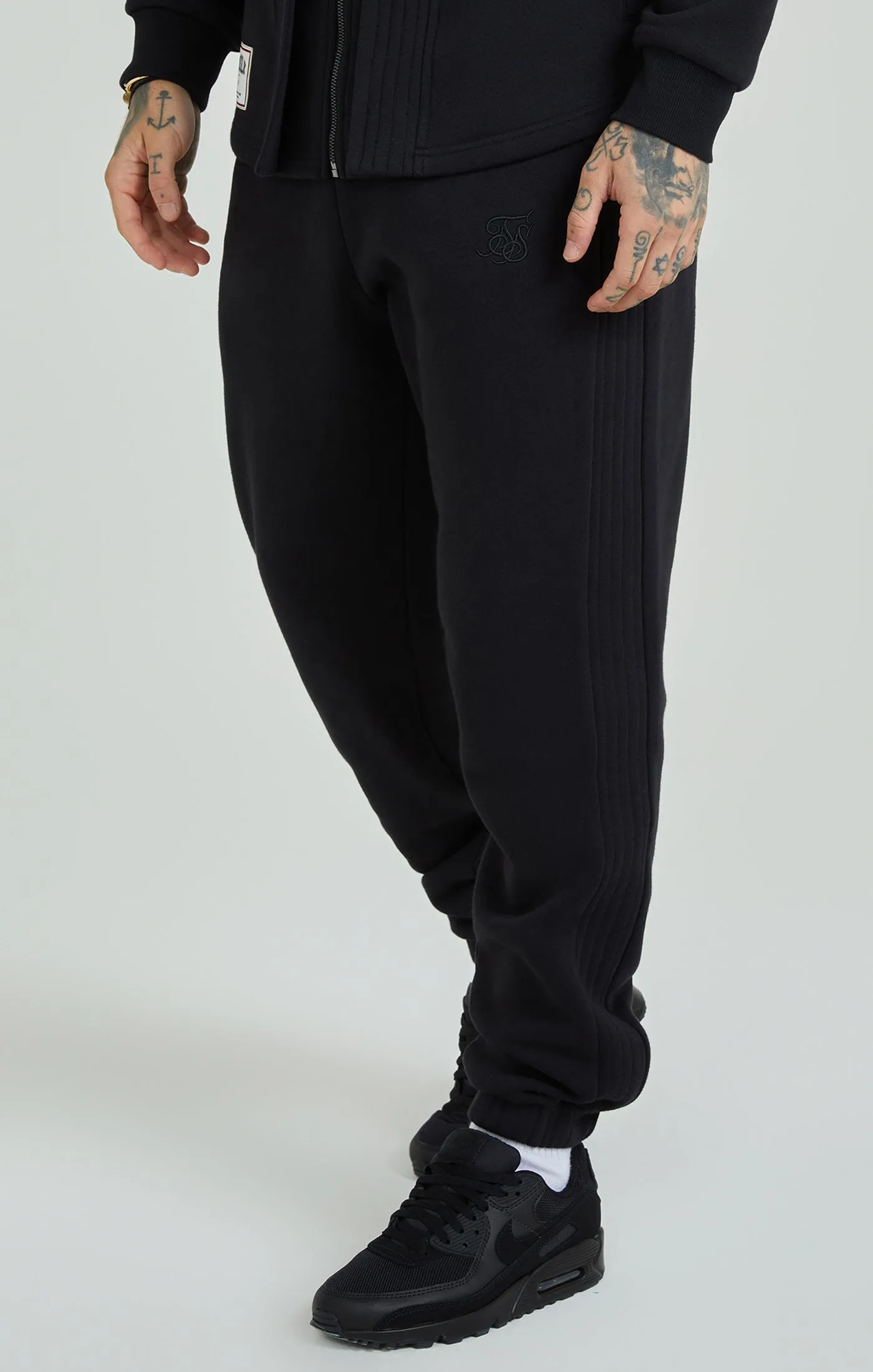 Black Panelled Relaxed Fit Joggers sold by Siksilk