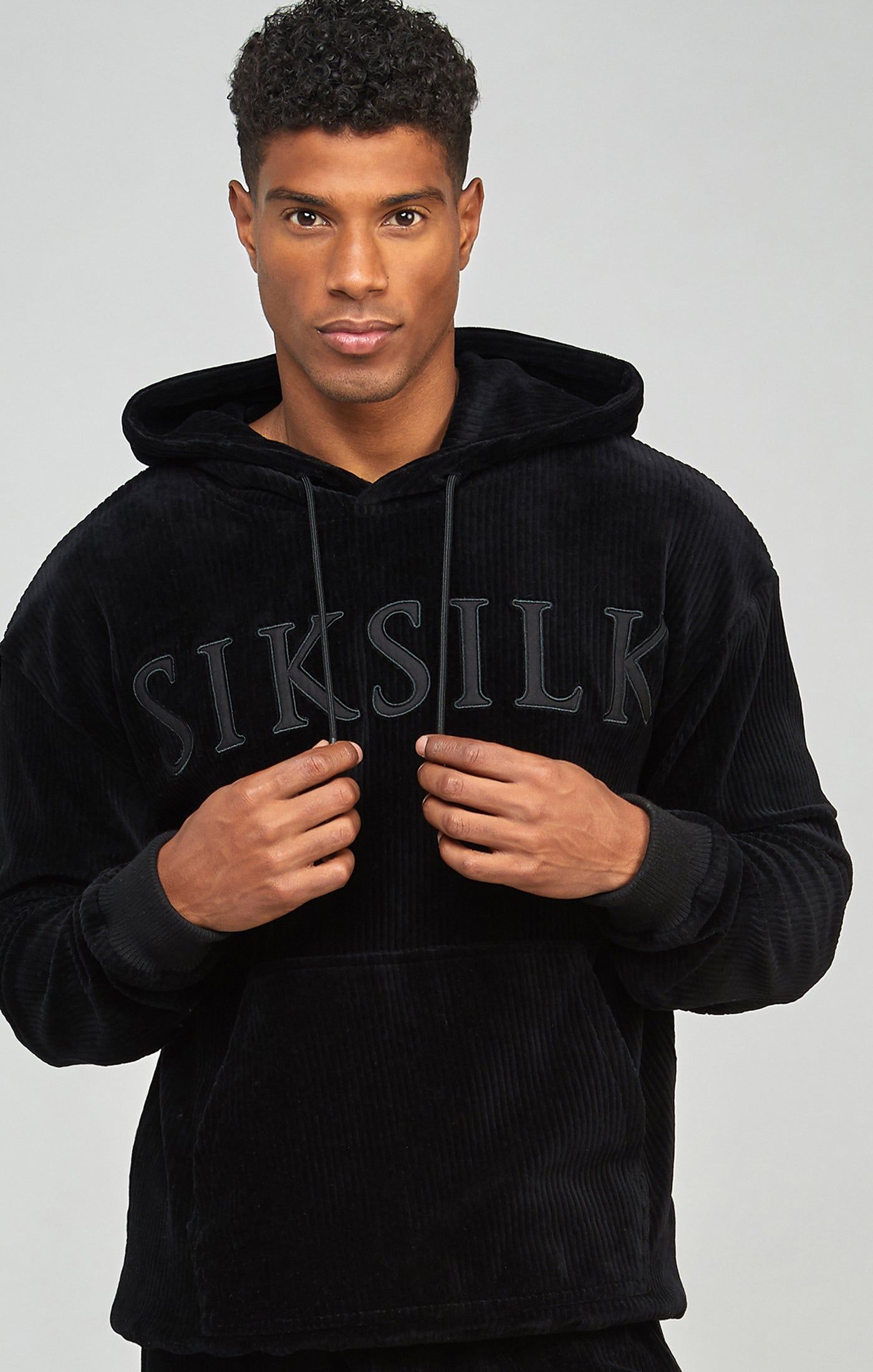 Black Corduroy Applique Logo Overhead Hoodie sold by Siksilk
