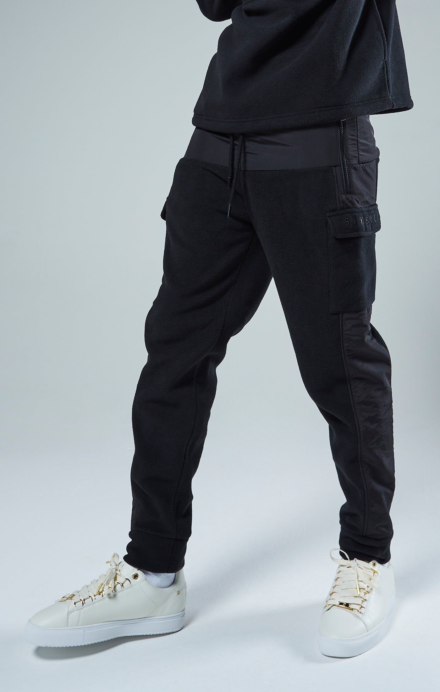 Black Polar Fleece Relaxed Jogger sold by Siksilk