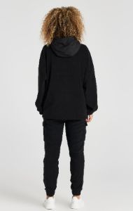 Black Polar Fleece Relaxed Jogger sold by Siksilk