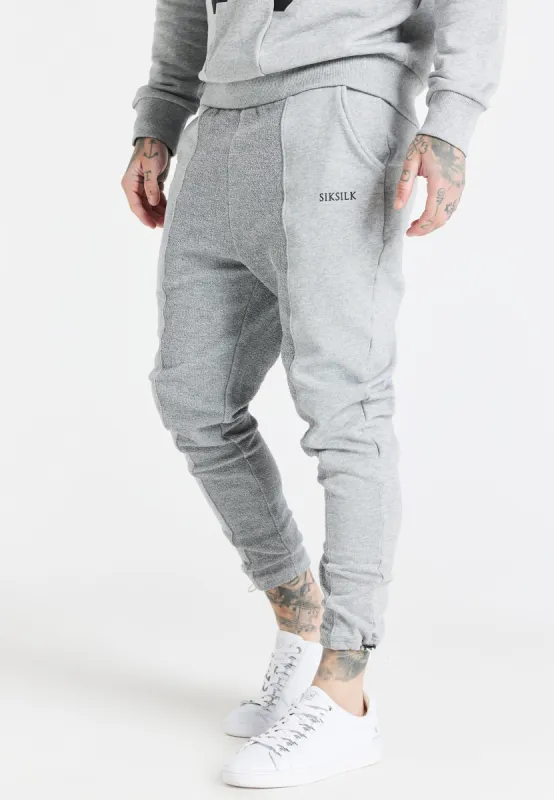 Grey Half And Half Toggle Pant sold by Siksilk