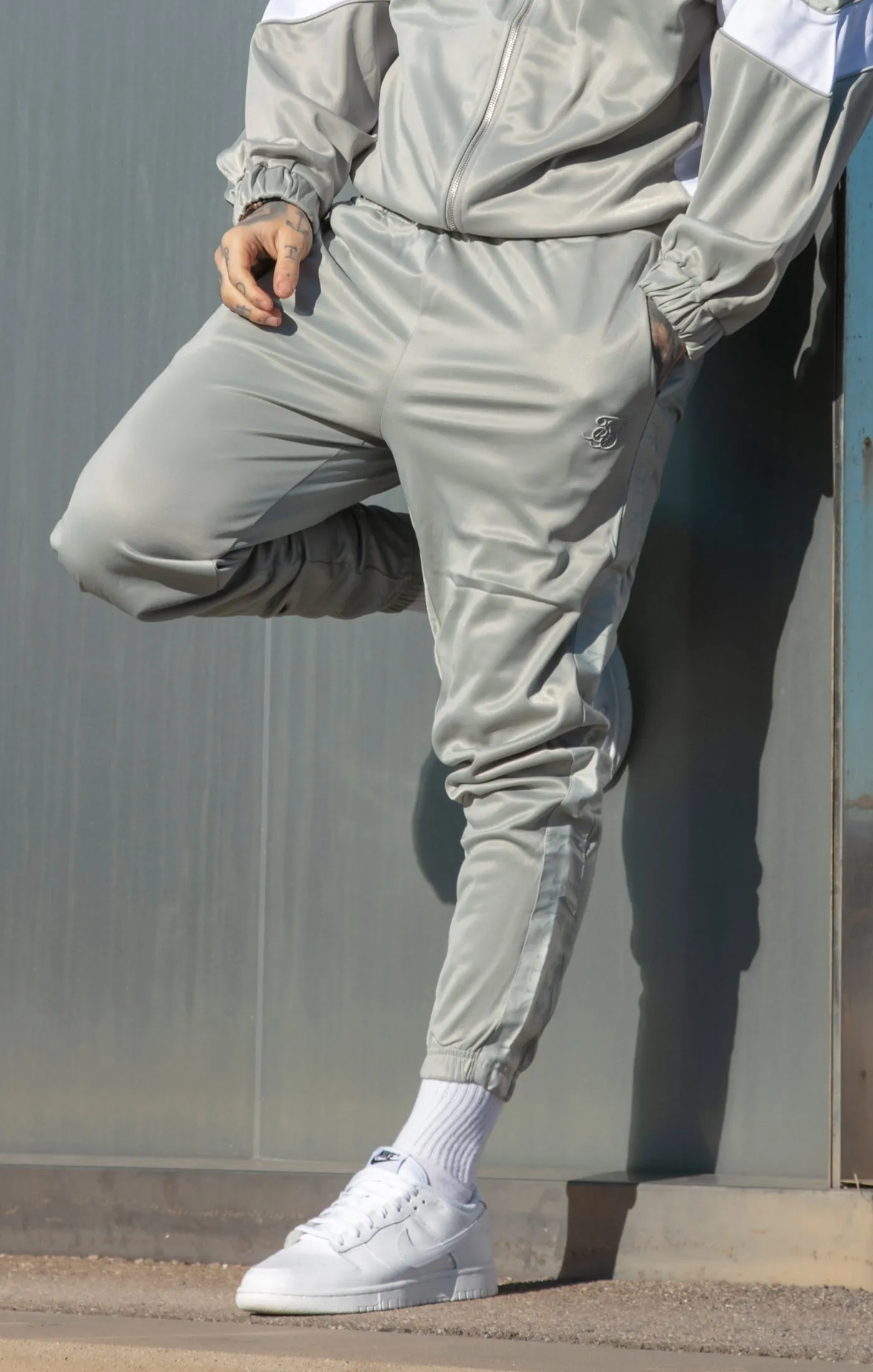 Grey Tape Thru Track Pant sold by Siksilk