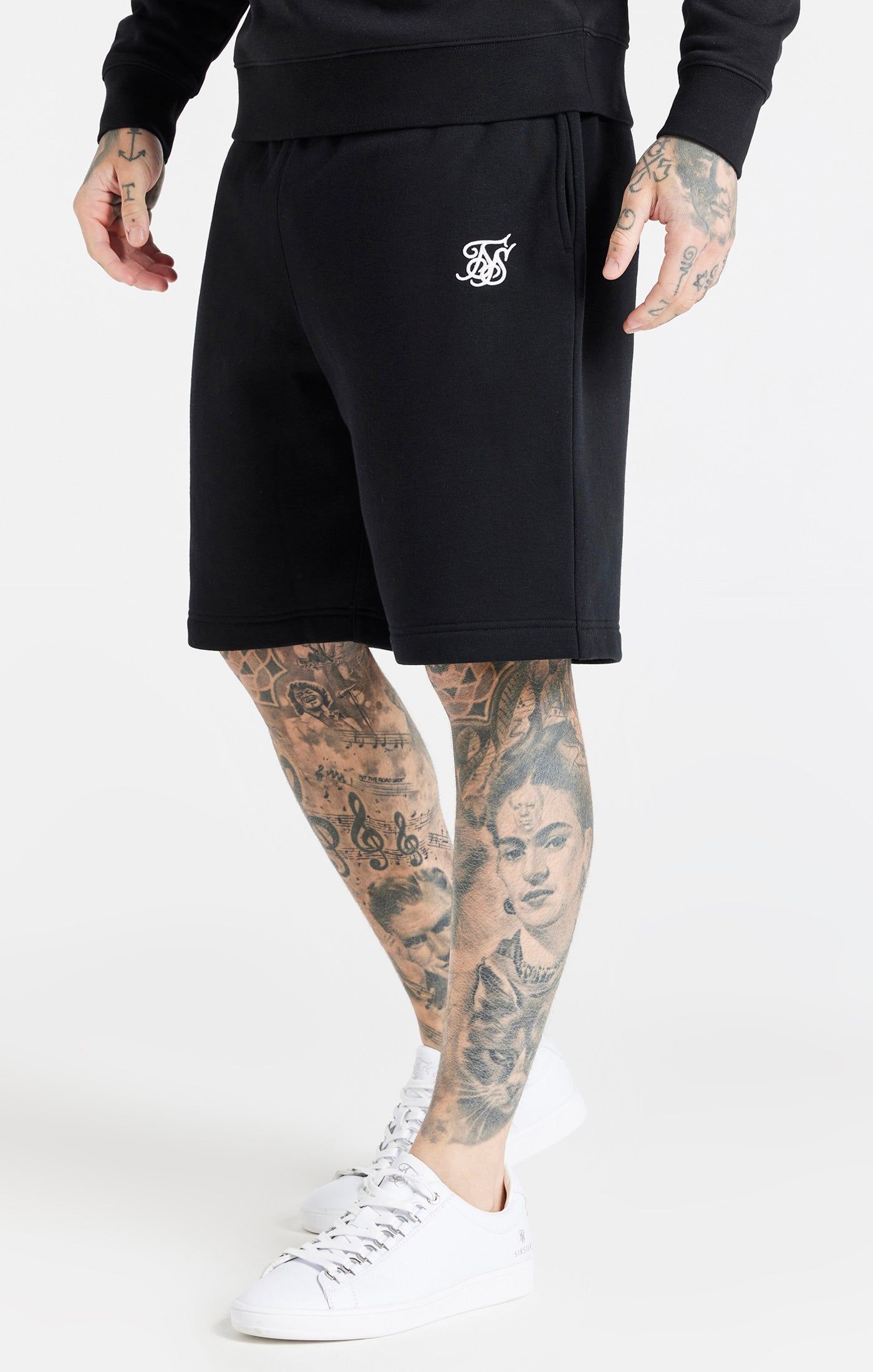 Black Essential Fleece Short sold by Siksilk