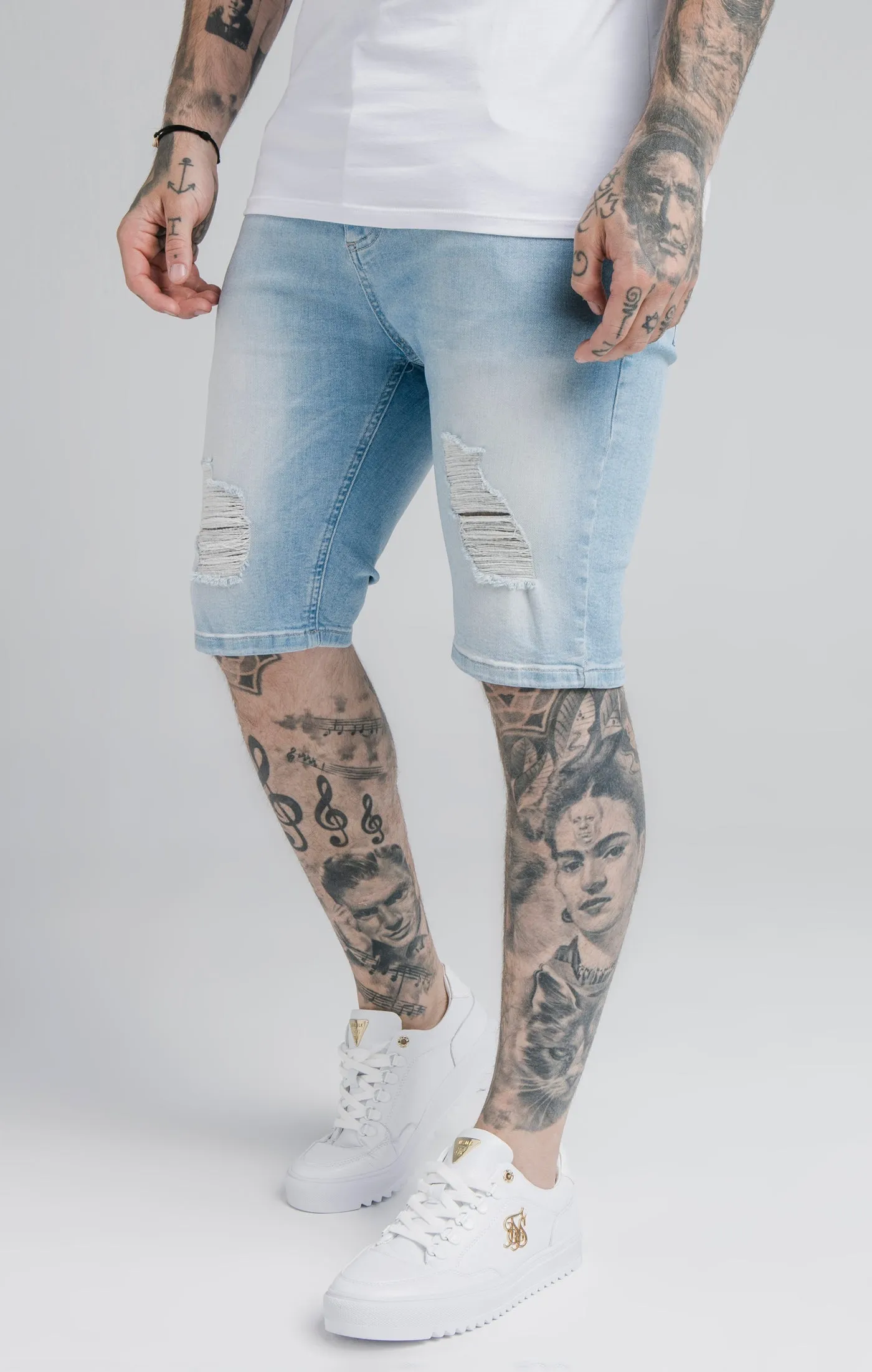 Blue Distressed Denim Short sold by Siksilk