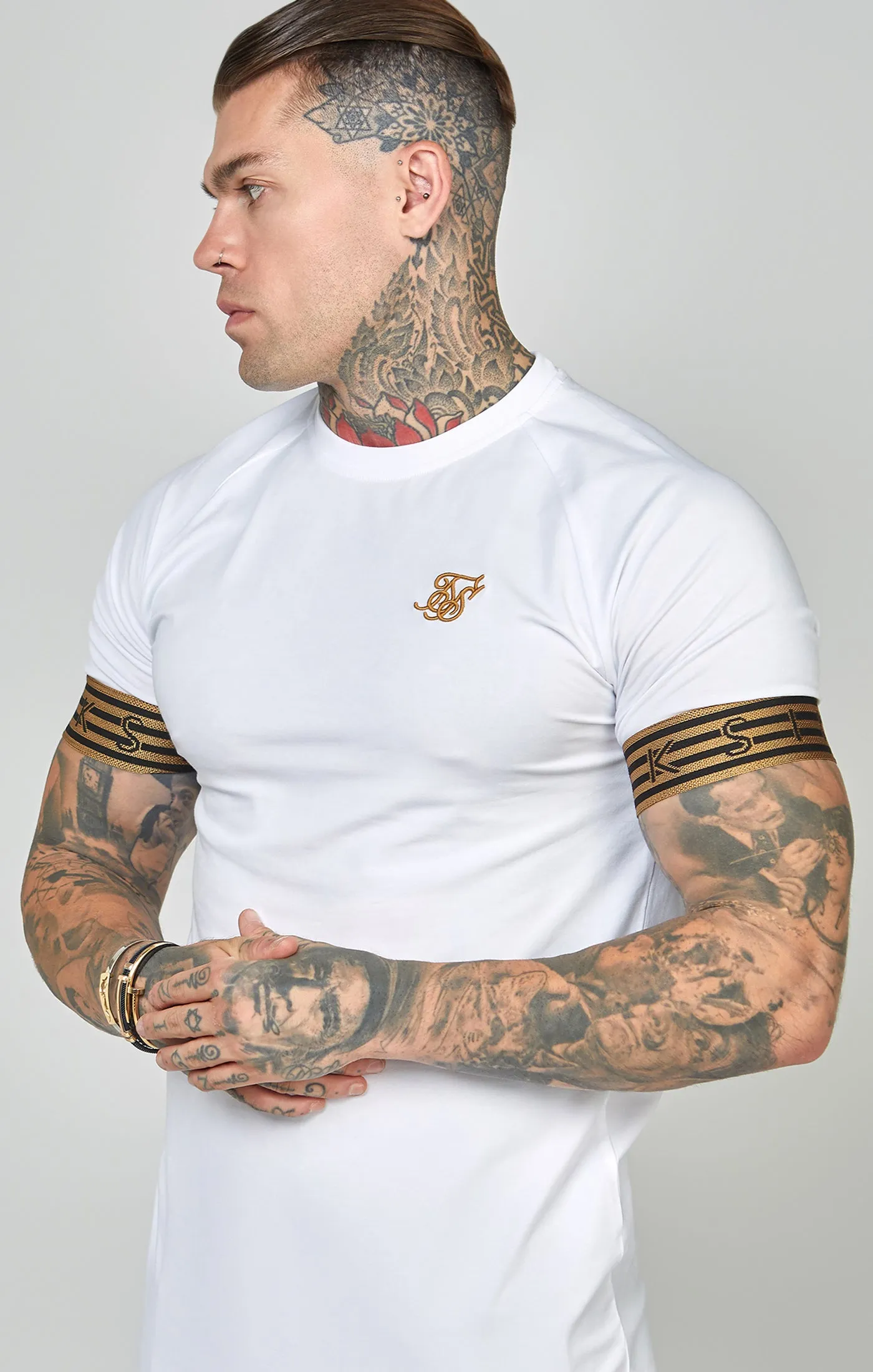 White, Gold Knitted Elastic Cuffed T-Shirt sold by Siksilk