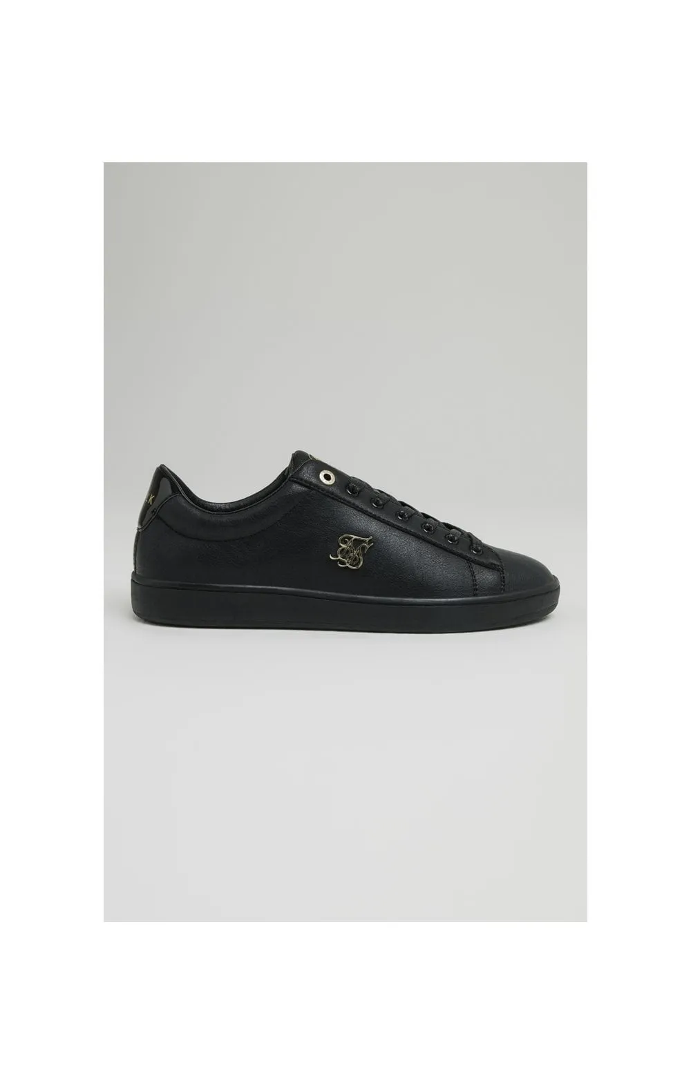 Black Low-Top Casual Trainer With Metal Logo sold by Siksilk