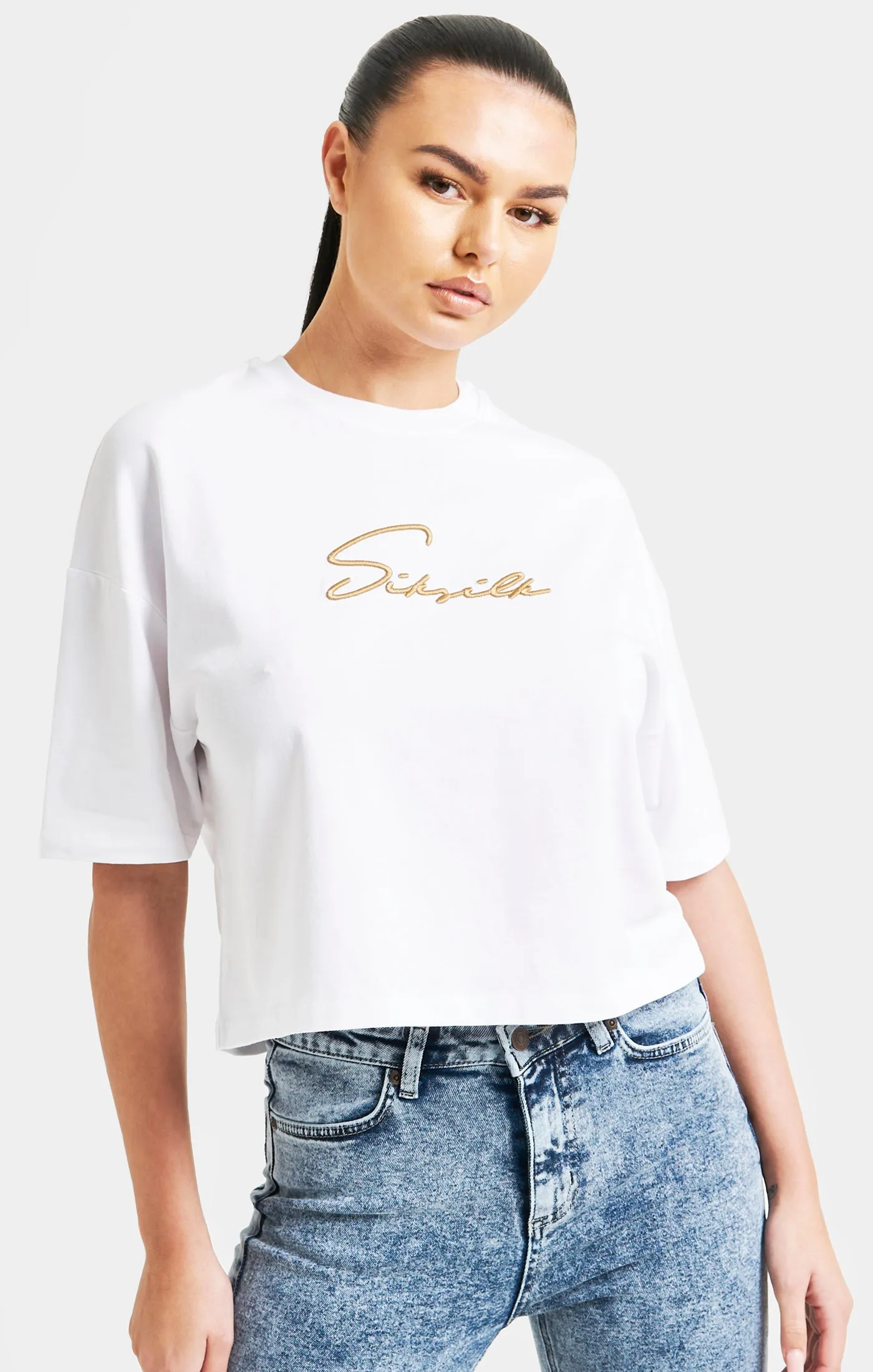 White Signature Crop Tee sold by Siksilk
