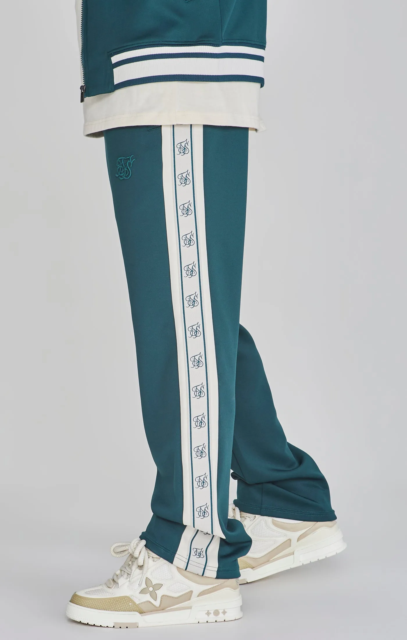 Green Track Pants sold by Siksilk