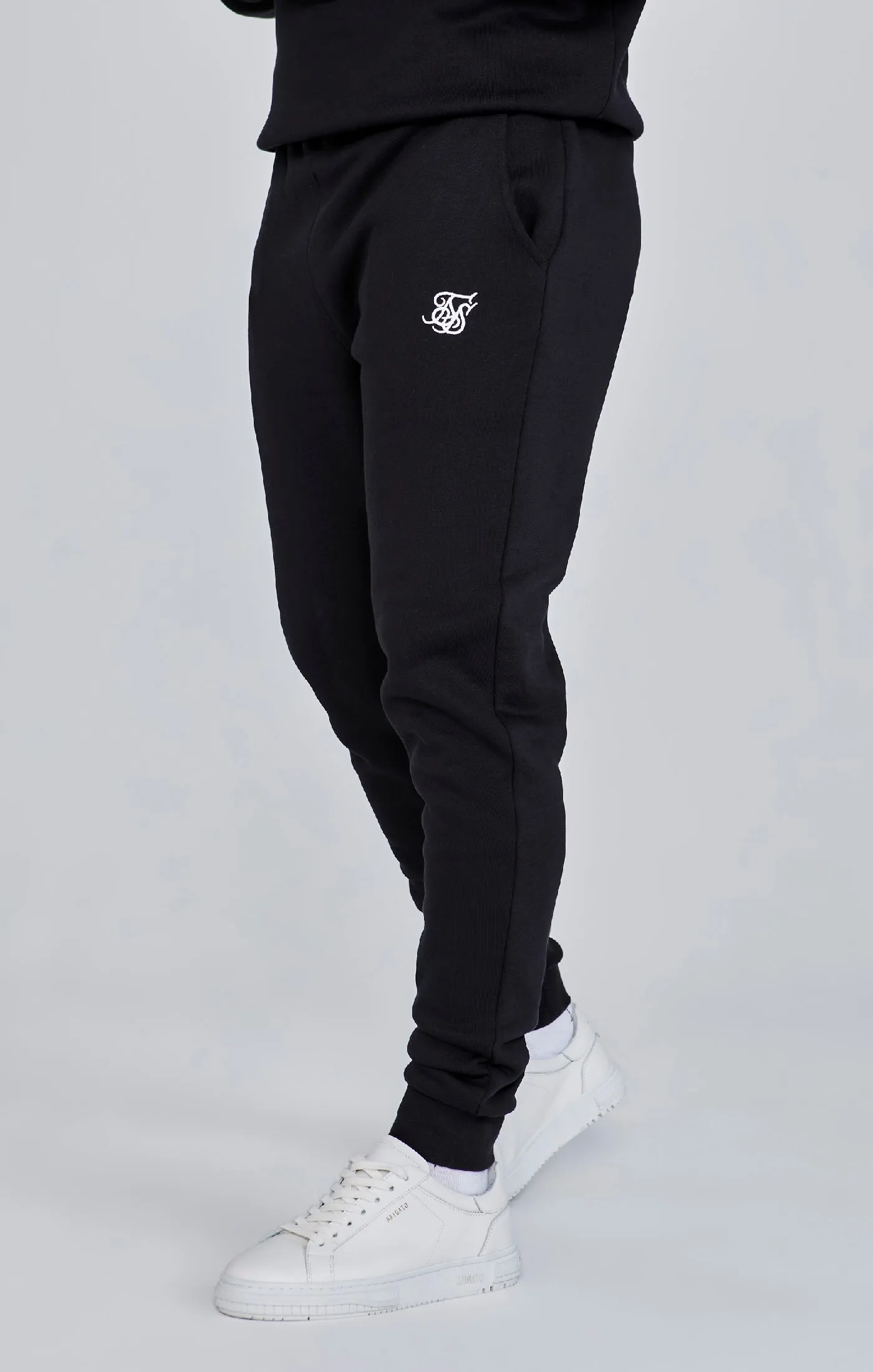 Black Essential Cuffed Jogger sold by Siksilk