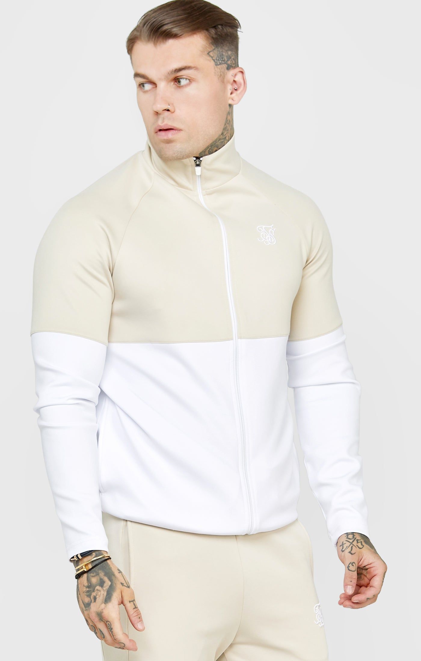 Stone Taped Raglan Track Top sold by Siksilk