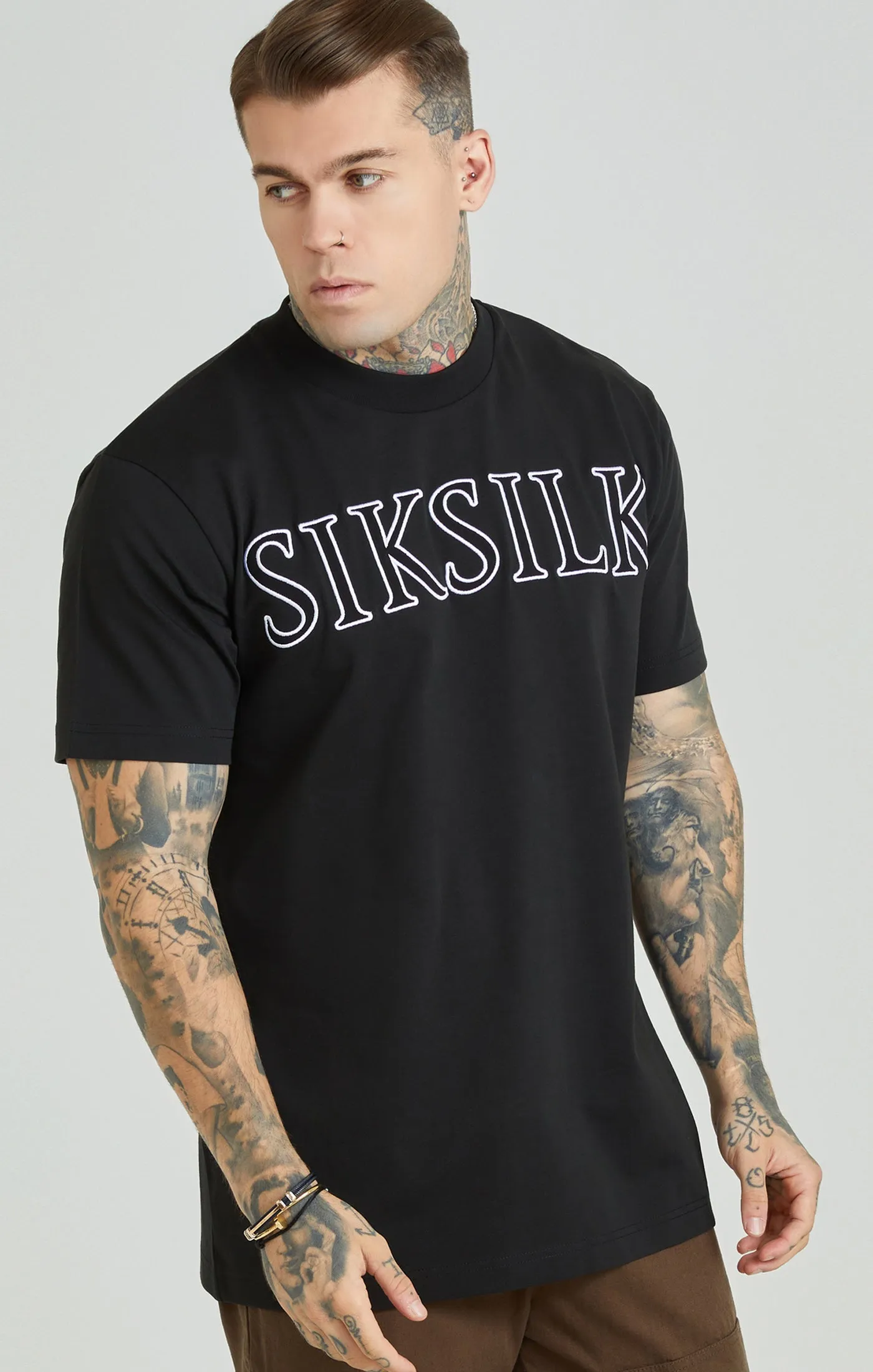 Black Applique Logo Oversized T-Shirt sold by Siksilk