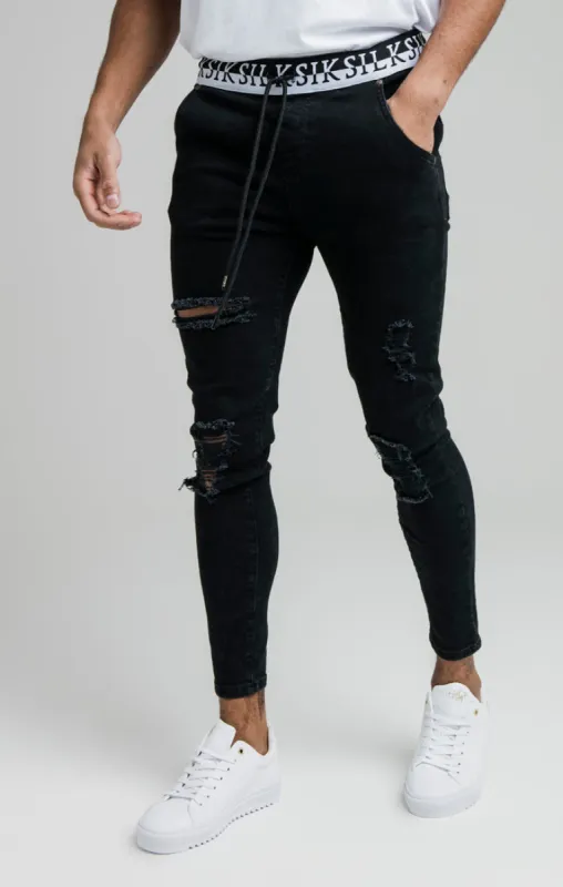 SikSilk Distressed Skinny Elasticated Jeans - Washed Black sold by Siksilk
