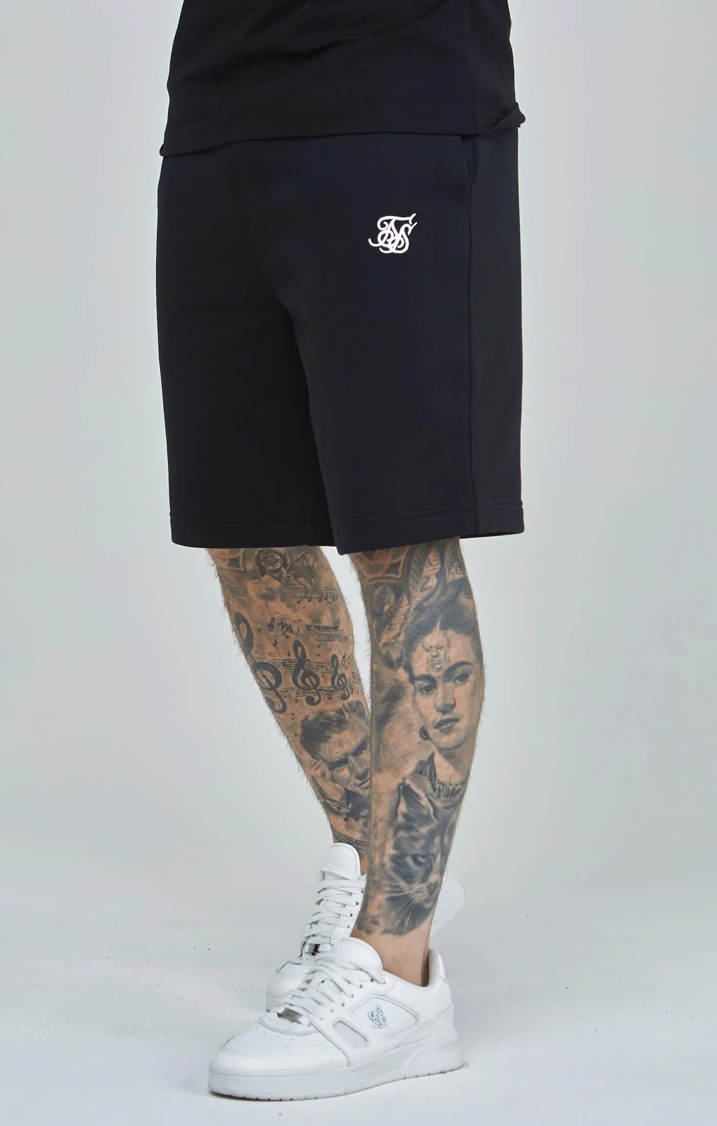 Black Essential Fleece Short sold by Siksilk