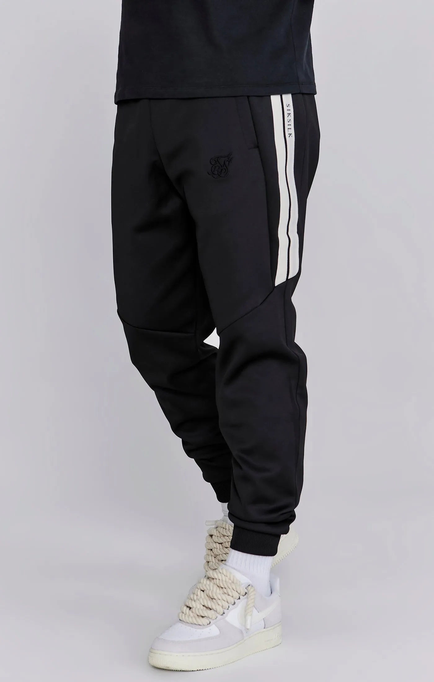 Black Relaxed Fit Joggers sold by Siksilk