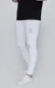 White Distressed Skinny Jeans sold by Siksilk