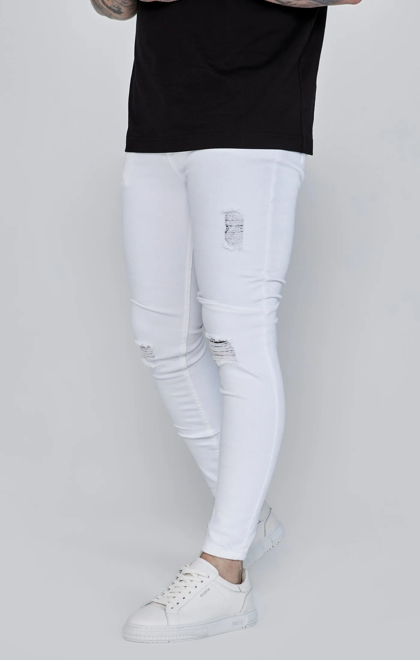 Skinny Jeans White sold by Siksilk