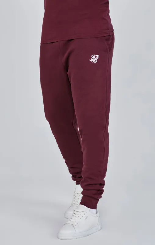 Burgundy Essentials Joggers sold by Siksilk