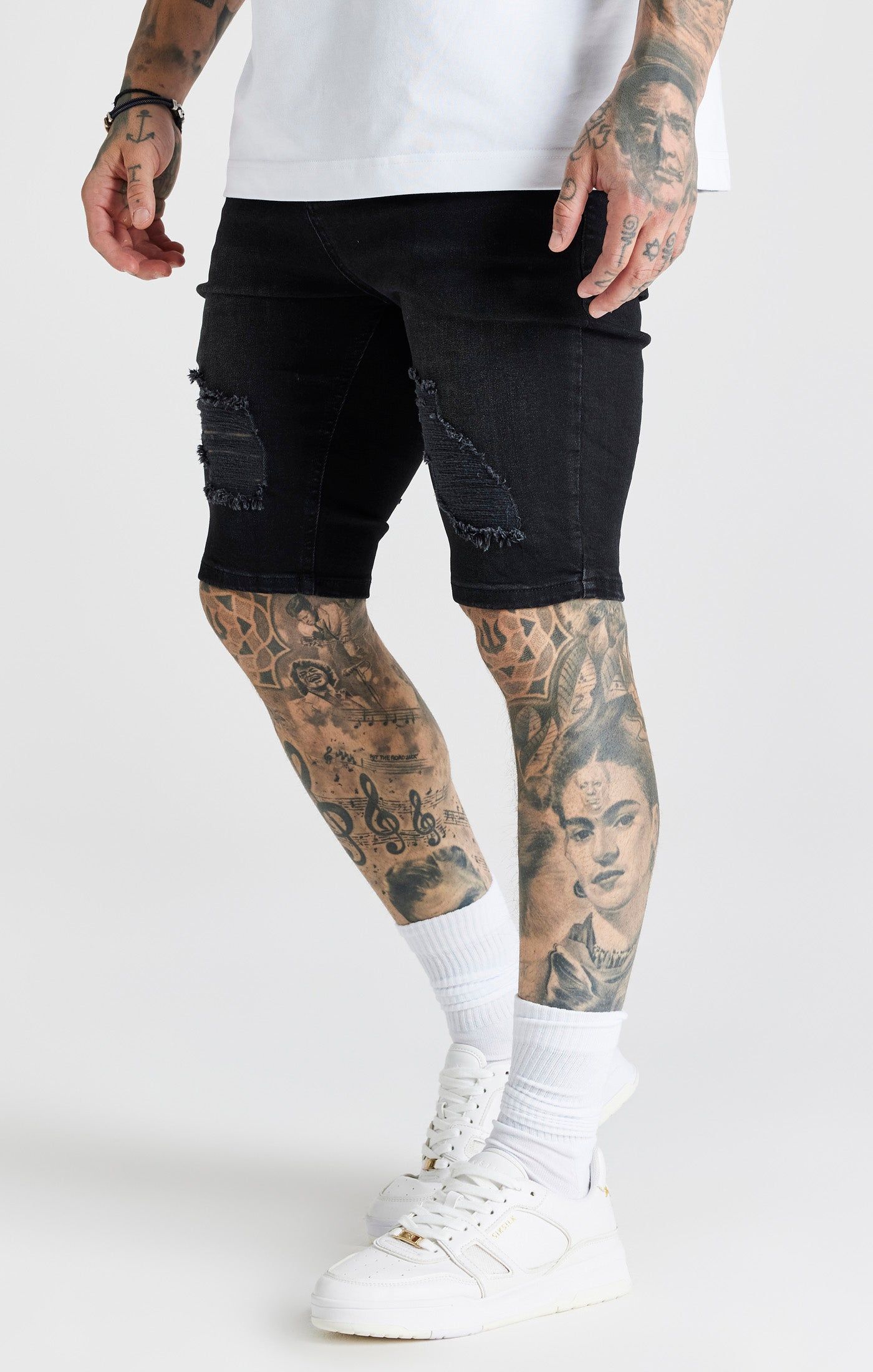 Black Distressed Denim Short sold by Siksilk