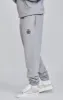 Grey Relaxed Fit Joggers sold by Siksilk