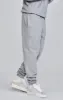 Grey Relaxed Fit Joggers sold by Siksilk