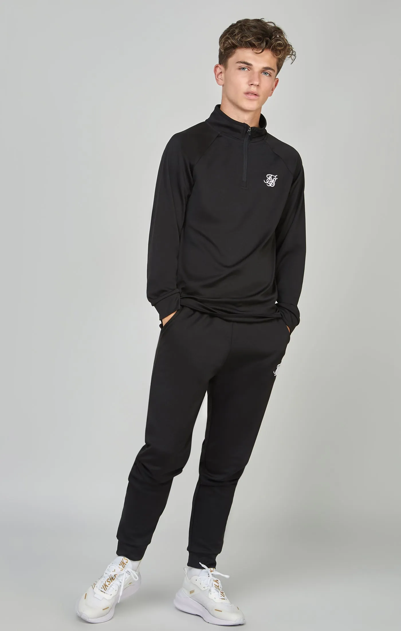 Boys Black 1/4 Zip & Jogger Tracksuit sold by Siksilk